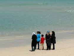 Musulmani sulla spiaggia
